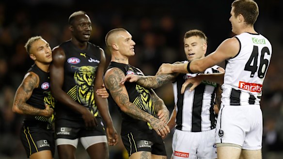 Dustin Martin and Mason Cox square off.