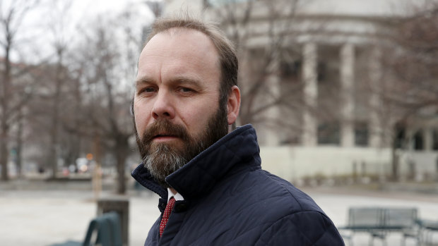 Rick Gates departs federal court in Washington in February.