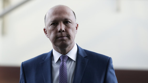 Peter Dutton says he plans to take legal action against Victorian minister Philip Dalidakis.