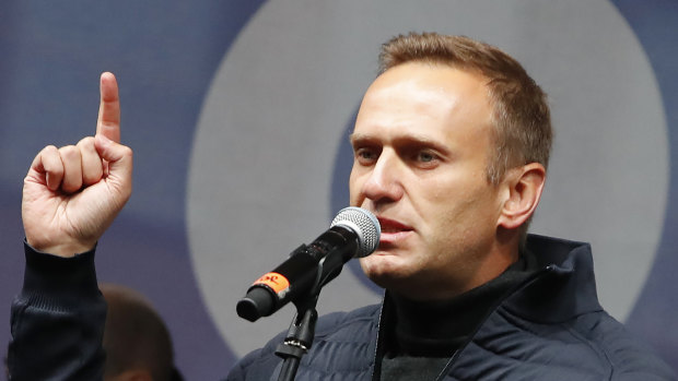 Russian opposition leader Alexei Navalny speaks during a rally to support political prisoners in Moscow, Russia.