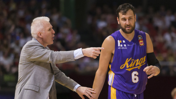 Sideline action: Bogut and coach Andrew Gaze come to terms with the game slipping away.