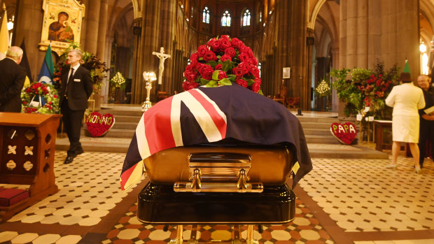 Draped in the Australian flag,  Sisto Malaspina's coffin awaits his state funeral.