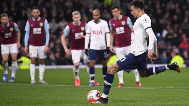 Dele Alli of Tottenham Hotspur scores from the penalty spot against Burnley at Turf Moor.
