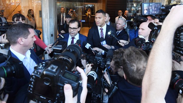 Israel Folau leaves his Fair Work Commission hearing in June.