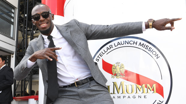 No hard feelings: Usain Bolt in the Mumm marquee during Victoria Derby Day.
