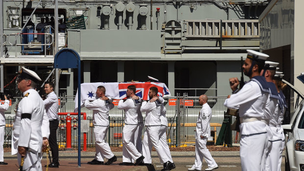Members of HMAS Melbourne carrying the coffin of Captain John Stevenson.
