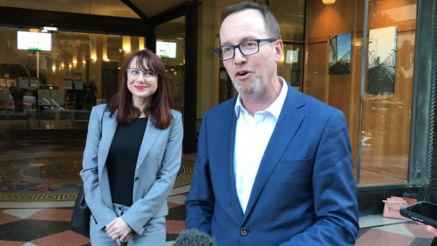 Greens MP David Shoebridge speaks outside court on Friday. Protester Felicity Kitson (left) was found guilty but she will appeal.