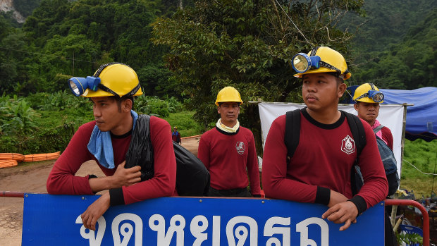 Thai forest rangers at a checkpoint on the road leading to Tham Luang Cave.