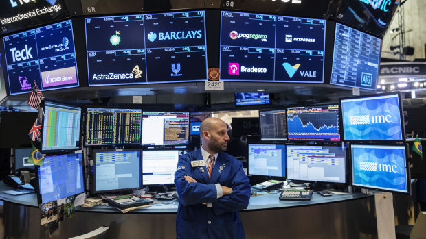 A trader on the floor of the New York Stock Exchange on Friday.