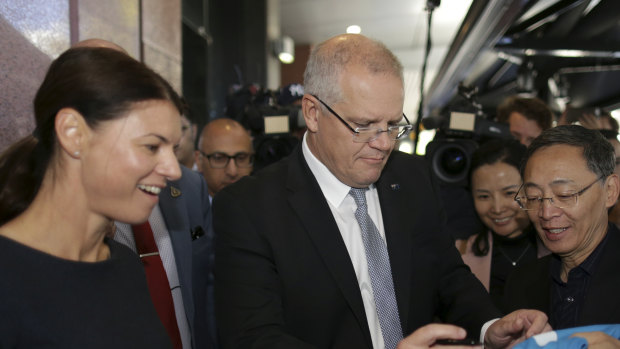 Prime Minister Scott Morrison and Liberal candidate for Reid, Fiona Martin, during a visit to Burwood.