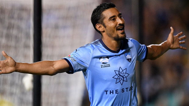 True Blue: Reza Ghoochannejhad scores his first goal for Sydney FC, against Adelaide.