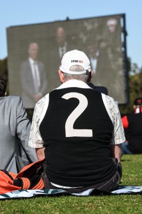 Fans gather at Moorabbin 
 to watch Danny Frawley's service.