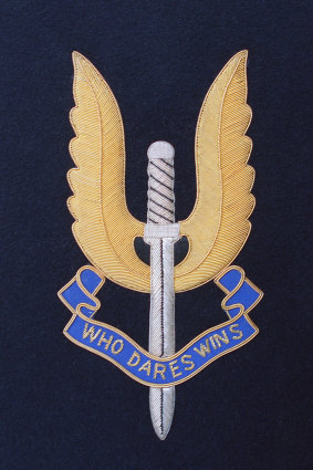 The SAS insignia: Who Dares Wins.