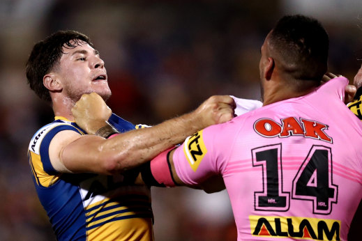 Tempers fray between Mitchell Moses and Tyrone May.