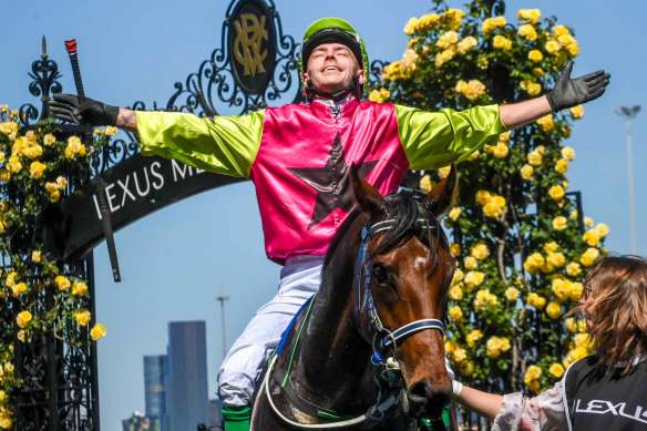 Jockey Robbie Dolan celebrates with Knight’s Choice after winning the Melbourne Cup.