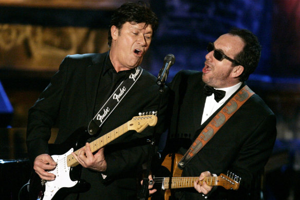 Robertson and Elvis Costello perform during an all-star tribute to New Orleans at the end of the 2006 Rock and Roll Hall of Fame induction ceremonies at the Waldorf Astoria Hotel in New York.
