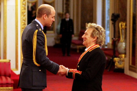 Rod Stewart, seen here with Prince William, was knighted in 2016. 
