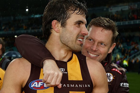 Finn Maginness with coach Sam Mitchell after the win against Port.