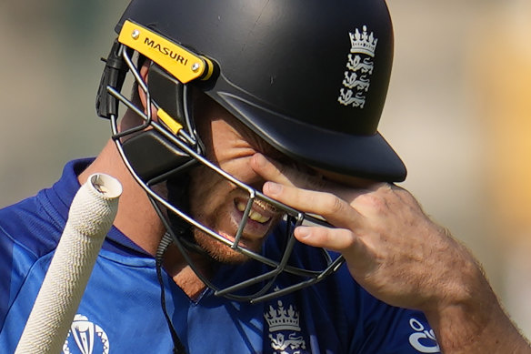 A frustrated Jos Butler leaves the ground after losing his wicket.