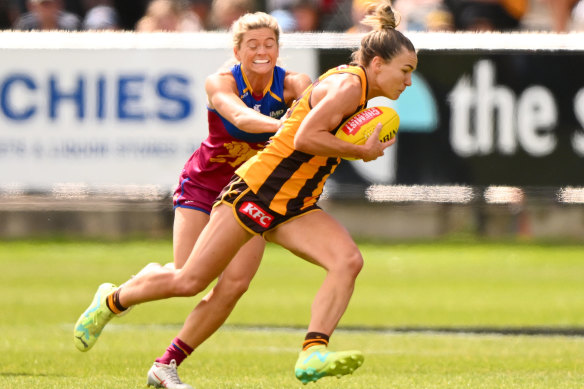 Emily Bates of the Hawks takes possession of the ball.
