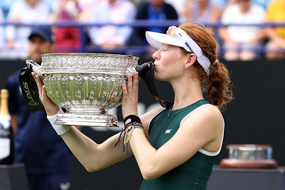 Joint with her trophy.
