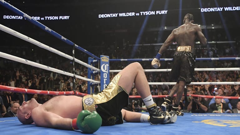 Fury was knocked down by Wilder  but got back up.