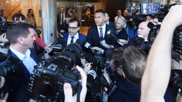 Israel Folau leaves his Fair Work Commission hearing in June.