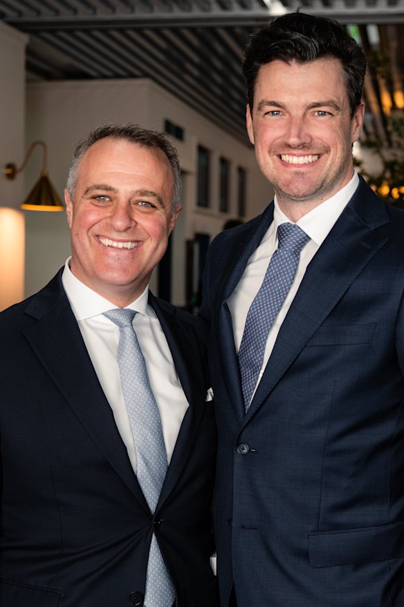 Tim Wilson and husband Ryan Bolger, controversially in navy, at the TAB marquee.