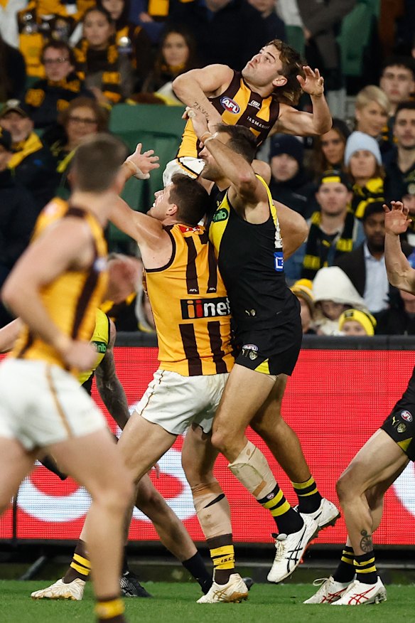 Watson flies in a marking contest against Richmond.