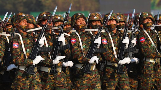 Soldiers march in Myanmar’s capital Naypyitaw in February.