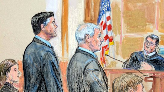 A courtroom sketch of former FBI director James Comey, second from left, during his arraignment on Wednesday.