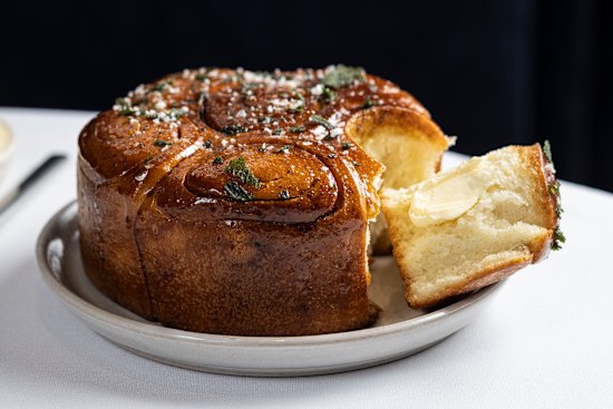  Complimentary bread: crown-shaped brioche brushed with a caramel made from vegetable scraps.