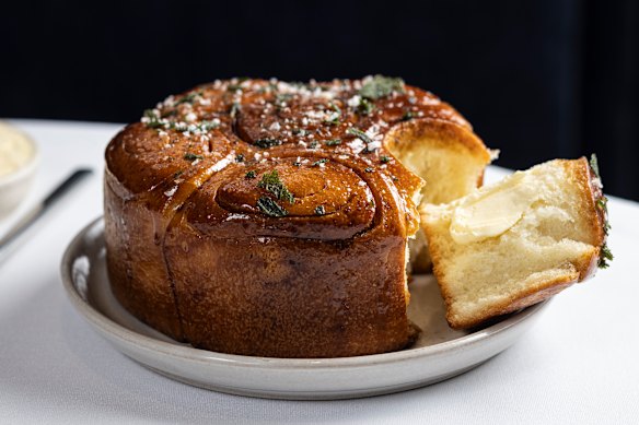  Complimentary bread: crown-shaped brioche brushed with a caramel made from vegetable scraps.