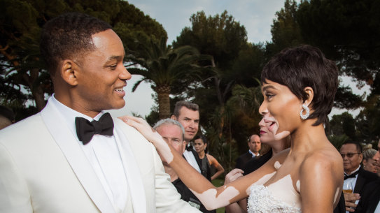 “I never would’ve been able to talk about that while he was alive,” Will Smith, pictured with model Winnie Harlow in France in 2017, said in an interview with GQ magazine about his late father, who physically abused his mother and propelled Smith into a lifetime of people pleasing.