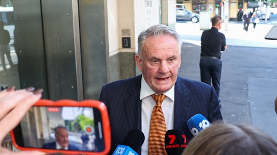 NSW MP Mark Latham leaving court.