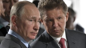Vladimir Putin with Gazprom CEO Alexey Miller.