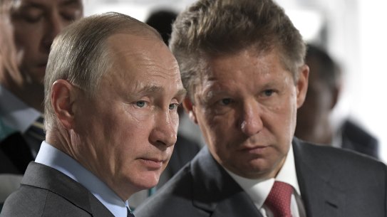 Vladimir Putin with Gazprom CEO Alexey Miller. Russian gas revenues have dried up.