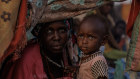 Zahra Tarreel Adam, 19, and her one-year-old Abdallah fled from their village of Kandobe in Darfur, Sudan. 