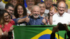 Former Brazilian President Luiz Inacio Lula da Silva celebrates with his wife Rosangela Silva, left, and running mate Geraldo Alckmin, right.