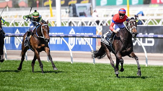 Verry Elleegant, storms away from Incentivise in the Melbourne Cup