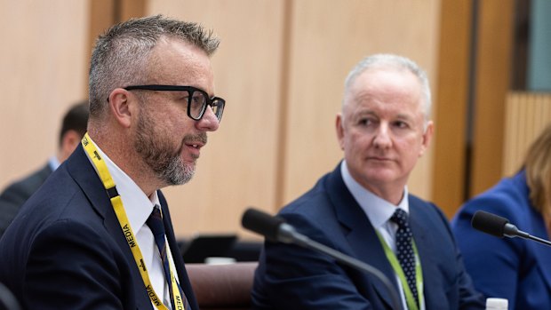 Justin Stevens (left) and ABC managing director Hugh Marks at a Senate estimates hearing in December.