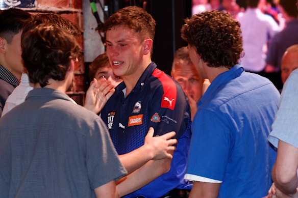 An emotional Sam Grlj was swamped by friends and family after Andrew Dillon read his name out.