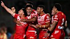 Tonga players celebrate a try in their upset win over New Zealand to reach the Pacific Championships final.