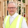 Anthony Albanese surveys a new home being built in suburban Melbourne during the election campaign. His governnment is on track to all 262,000 homes short of its 1.2 million target.