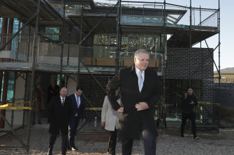 Prime Minister Scott Morrison visits a building site on Thursday. He announced a new scheme aiming to boost construction.