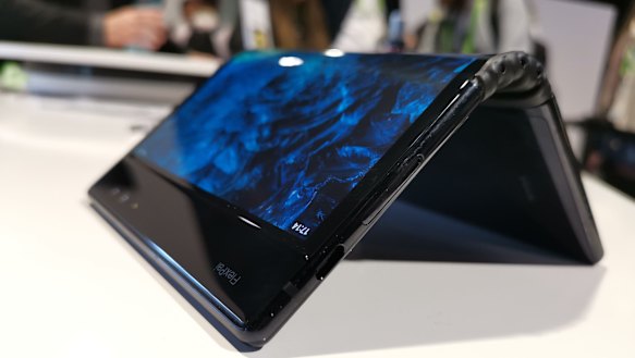 The rubber hinge isn't the prettiest, but it works.