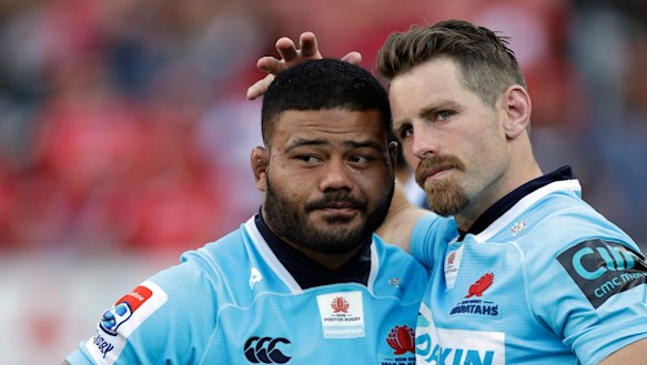 Bernard Foley consoles Tolu Latu. 