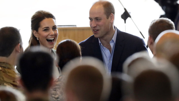 Prince William and Kate, the Duchess of Cambridge,  greet personnel in the hangar at the Akrotiri Royal Air Force base in Cyprus.