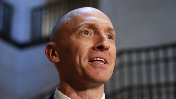 Carter Page speaks with reporters following a day of questions from the House Intelligence Committee on Capitol Hill in Washington in 2017.