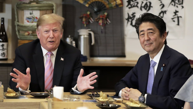 Trump and Abe have dinner at the Inakaya restaurant in the Roppongi district of Tokyo.